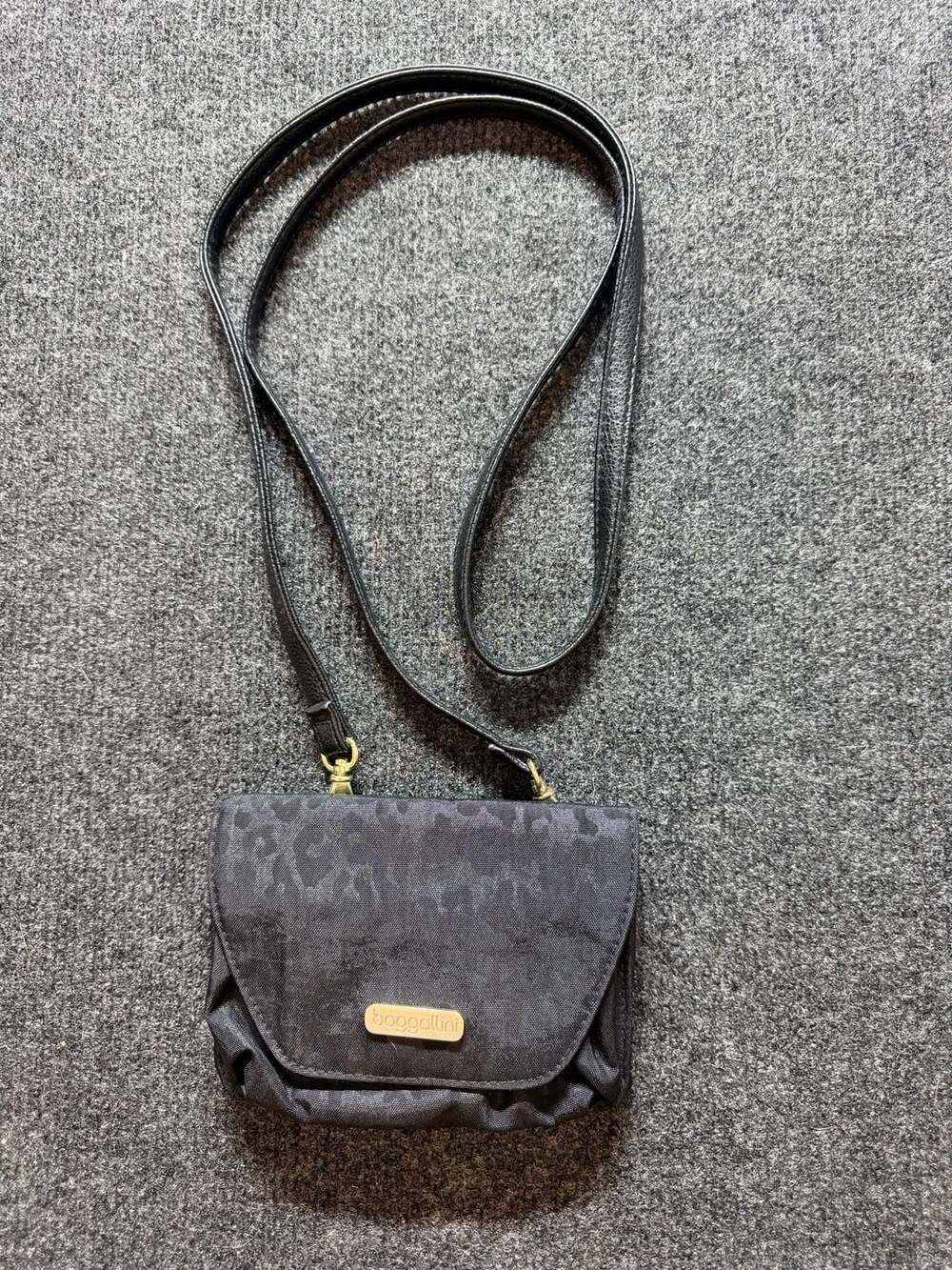 Baggallini Black Animal print small multi-pocket crossbody bag